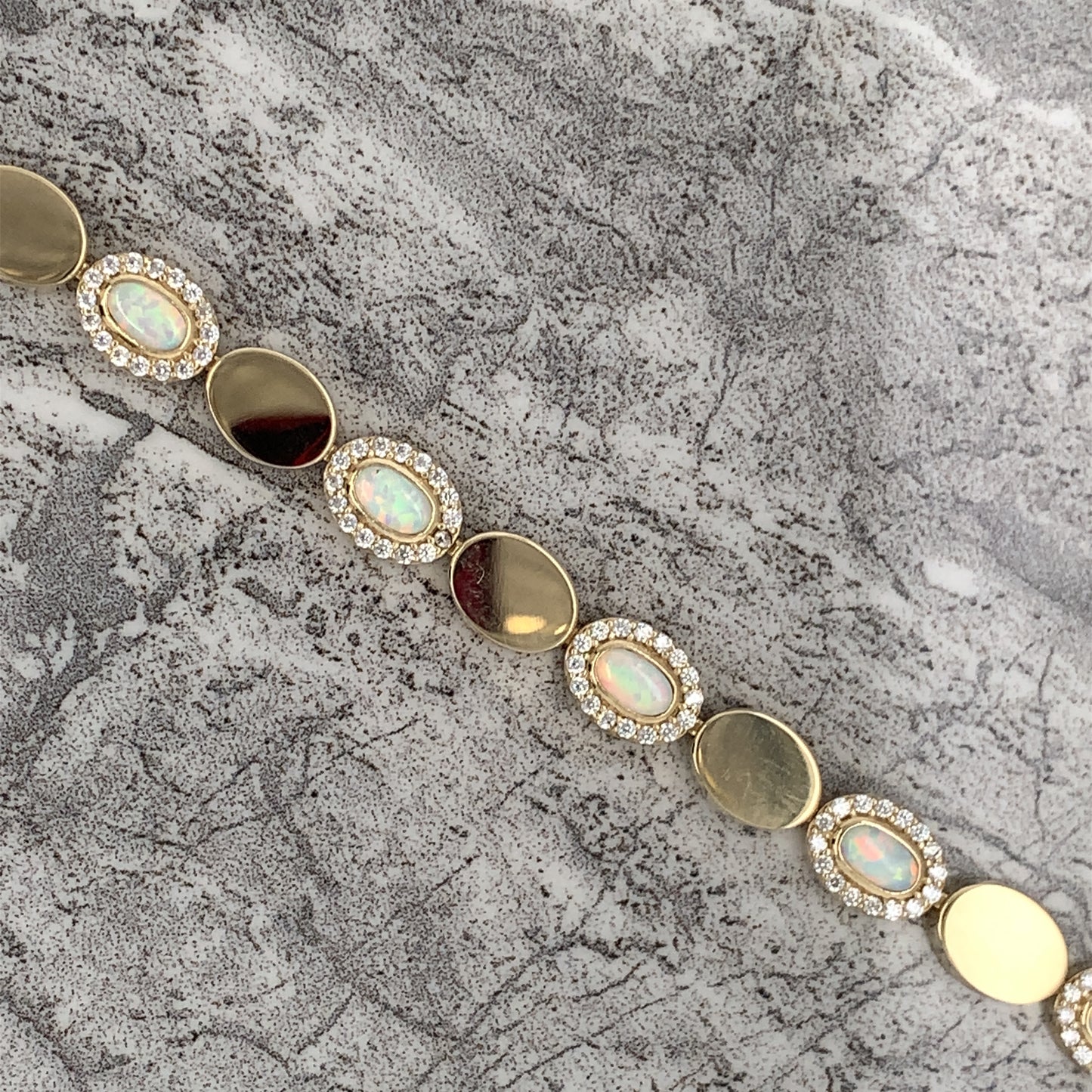 9ct Gold Oval Created Opal & Disc Bracelet