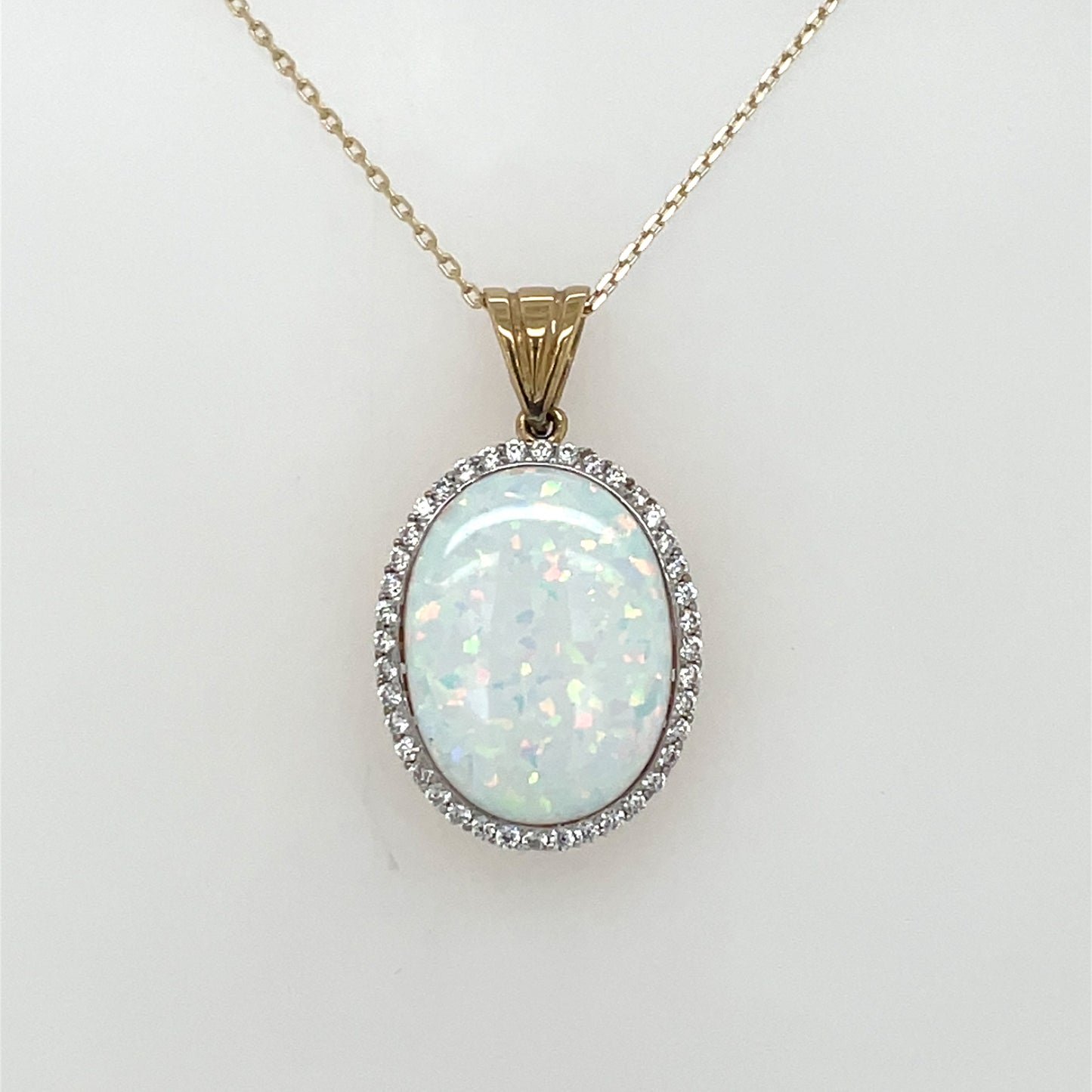 9ct Gold Created Opal & CZ Oval Halo Pendant GPL59