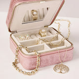 Square powder pink jewellery box in man-made velvet