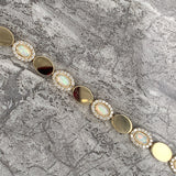 9ct Gold Oval Created Opal  & Disc Bracelet