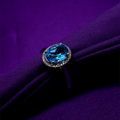 9ct White Gold Blue Topaz Oval Halo Diamond Ring WRX071