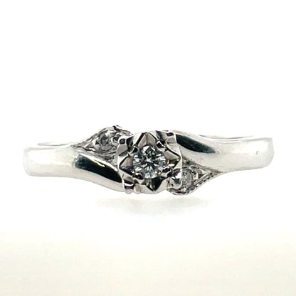 9ct White Gold Diamond 0.06ct Crossover Solitaire Ring Z059