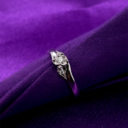 9ct White Gold Diamond 0.06ct Crossover Solitaire Ring Z059