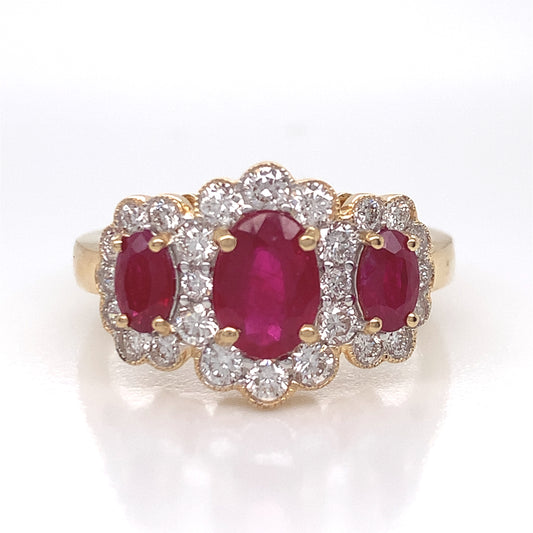 18ct Gold Ruby & Diamond Halo Three Stone Ring