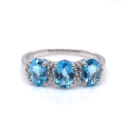 9ct  White Gold Blue Topaz & CZ Trilogy Ring